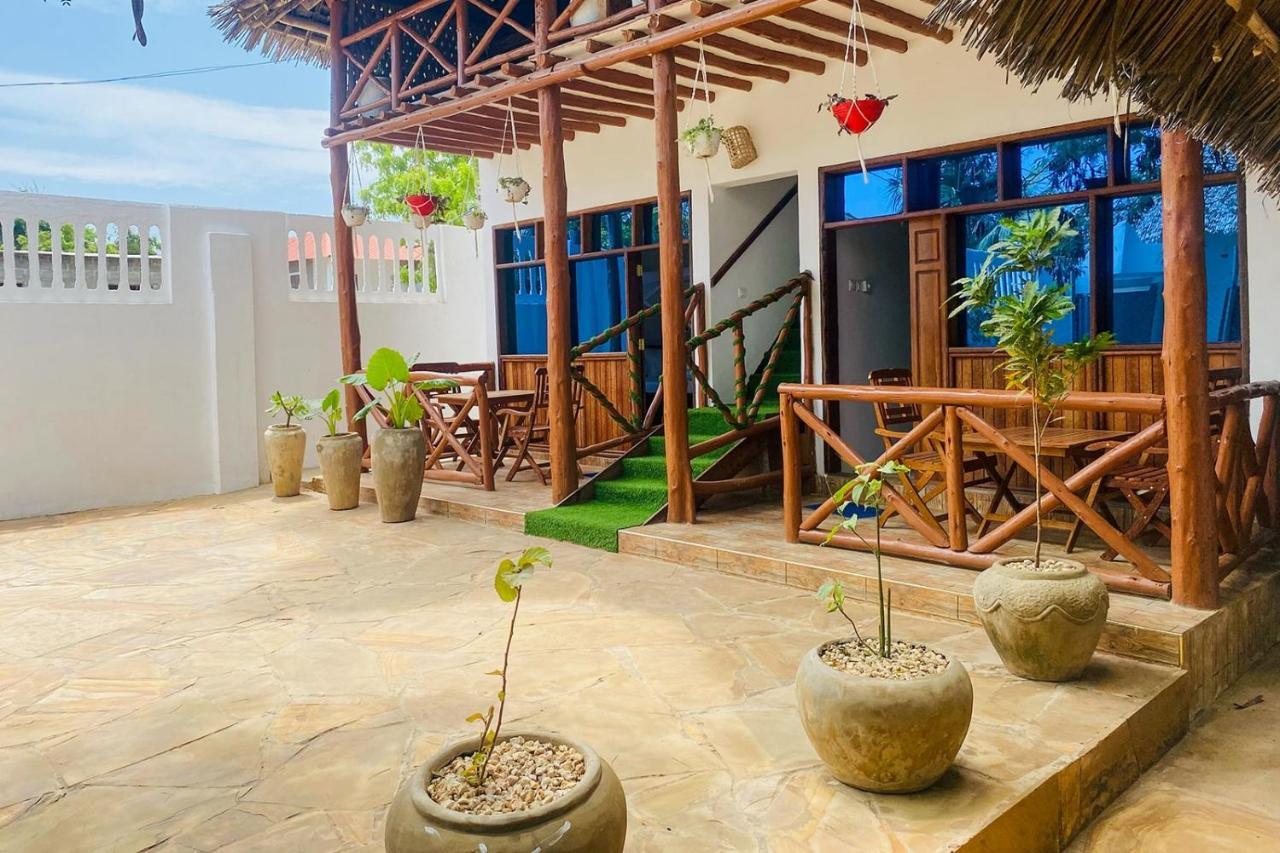 Utulivu Bungalow Нунгви Екстериор снимка