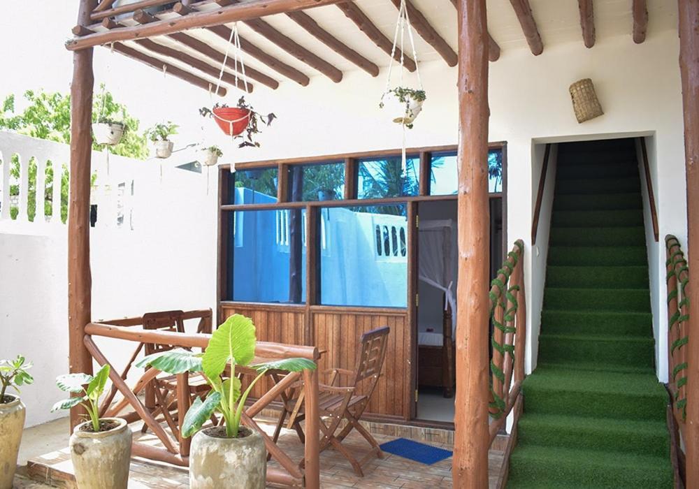 Utulivu Bungalow Нунгви Екстериор снимка