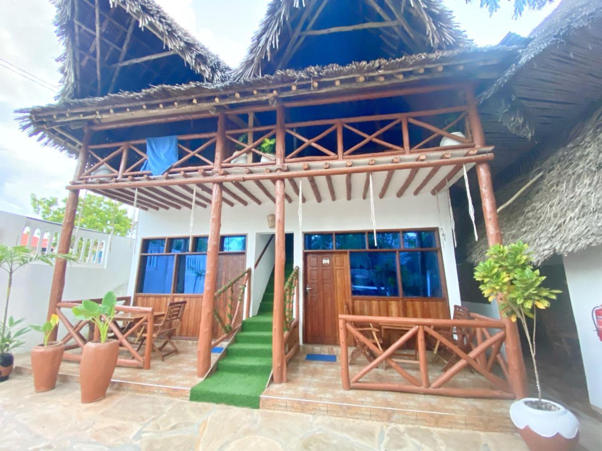 Utulivu Bungalow Нунгви Екстериор снимка