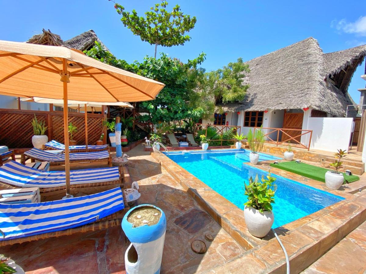 Utulivu Bungalow Нунгви Екстериор снимка