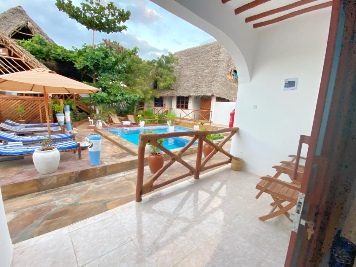 Utulivu Bungalow Нунгви Екстериор снимка