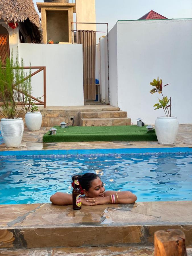 Utulivu Bungalow Нунгви Екстериор снимка
