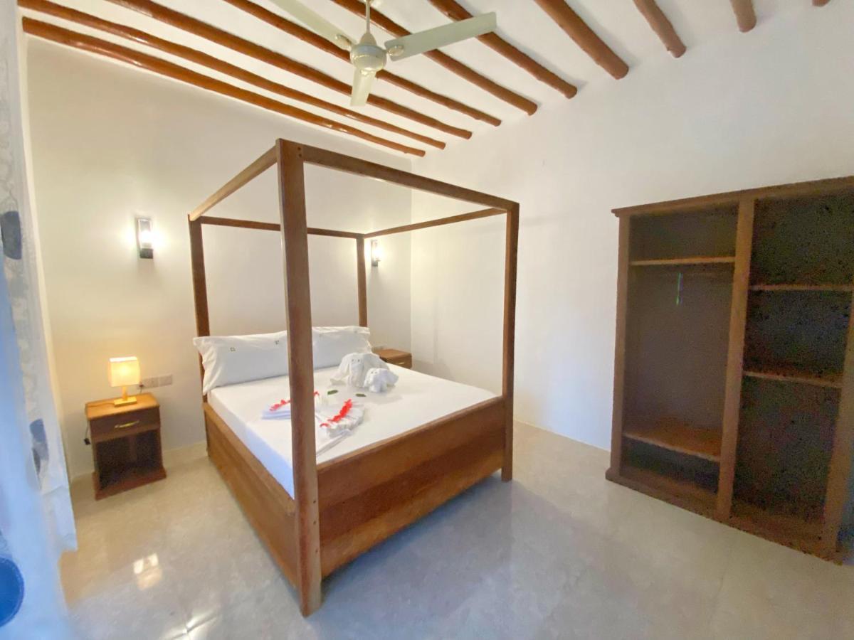 Utulivu Bungalow Нунгви Екстериор снимка
