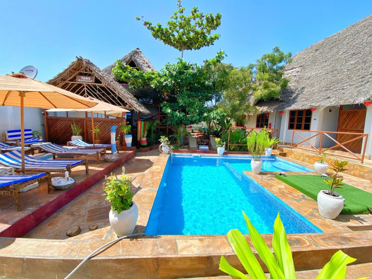 Utulivu Bungalow Нунгви Екстериор снимка