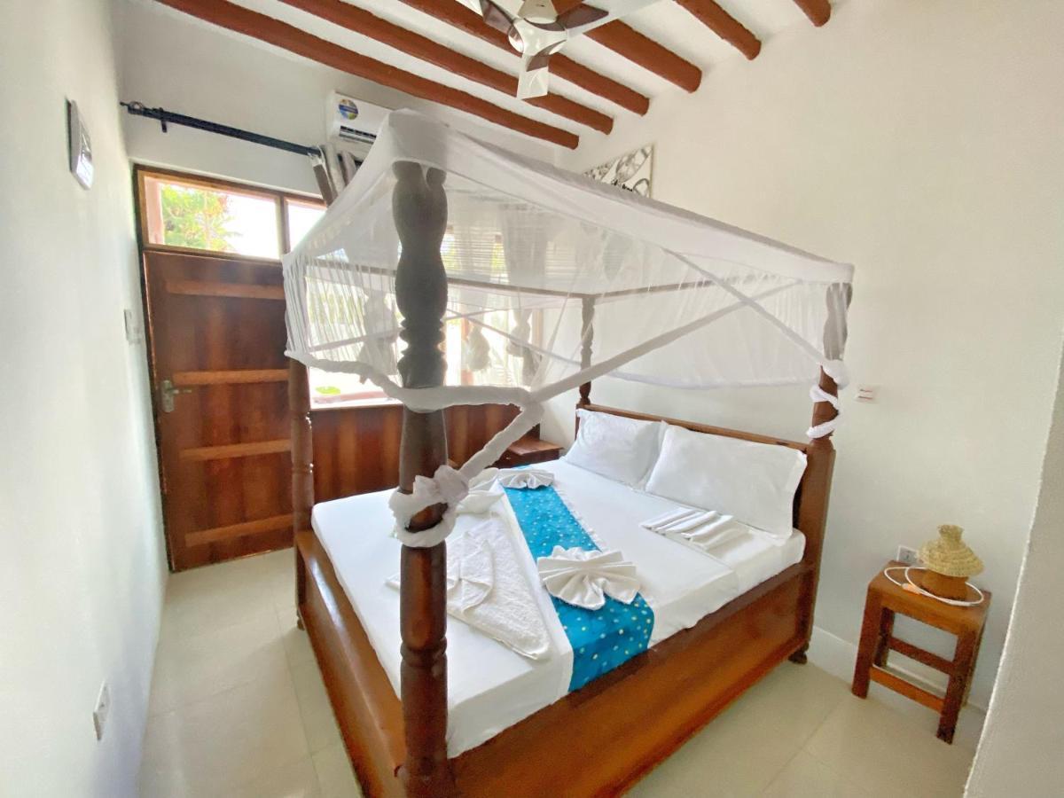 Utulivu Bungalow Нунгви Екстериор снимка