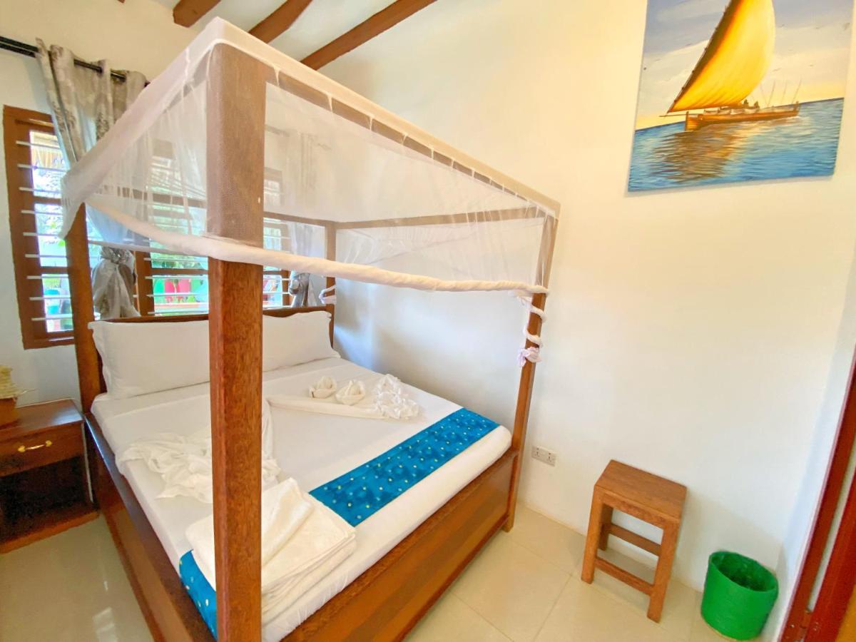 Utulivu Bungalow Нунгви Екстериор снимка