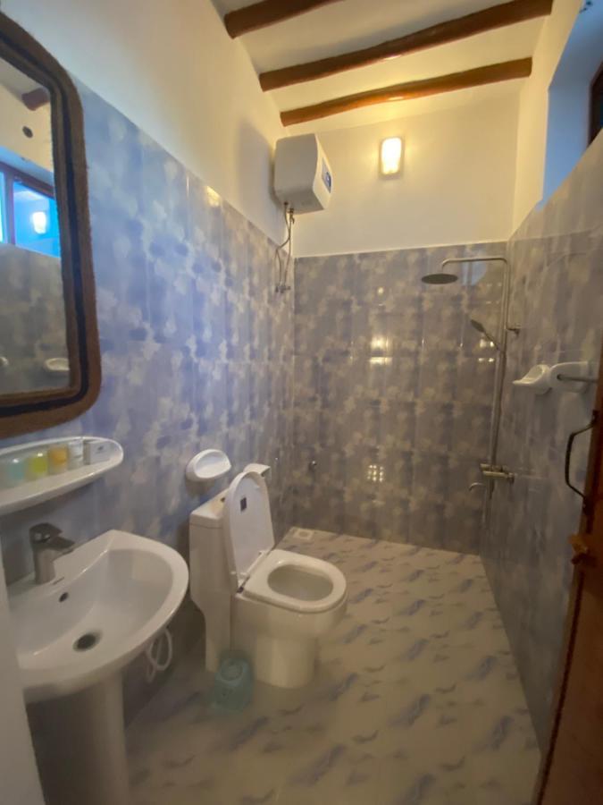 Utulivu Bungalow Нунгви Екстериор снимка
