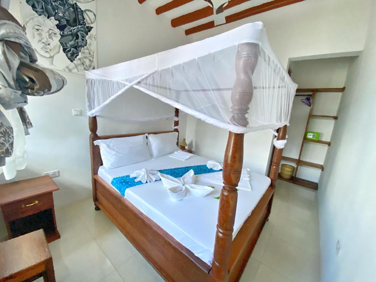 Utulivu Bungalow Нунгви Екстериор снимка