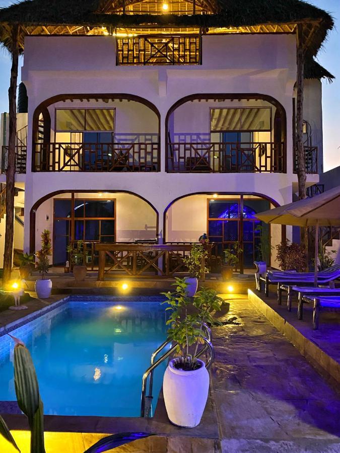 Utulivu Bungalow Нунгви Екстериор снимка