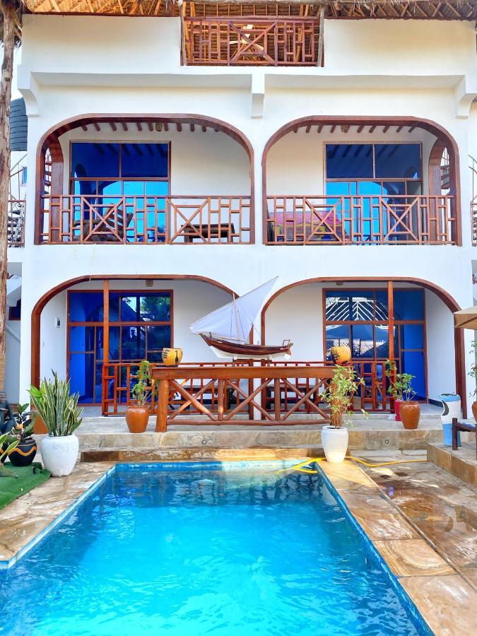 Utulivu Bungalow Нунгви Екстериор снимка