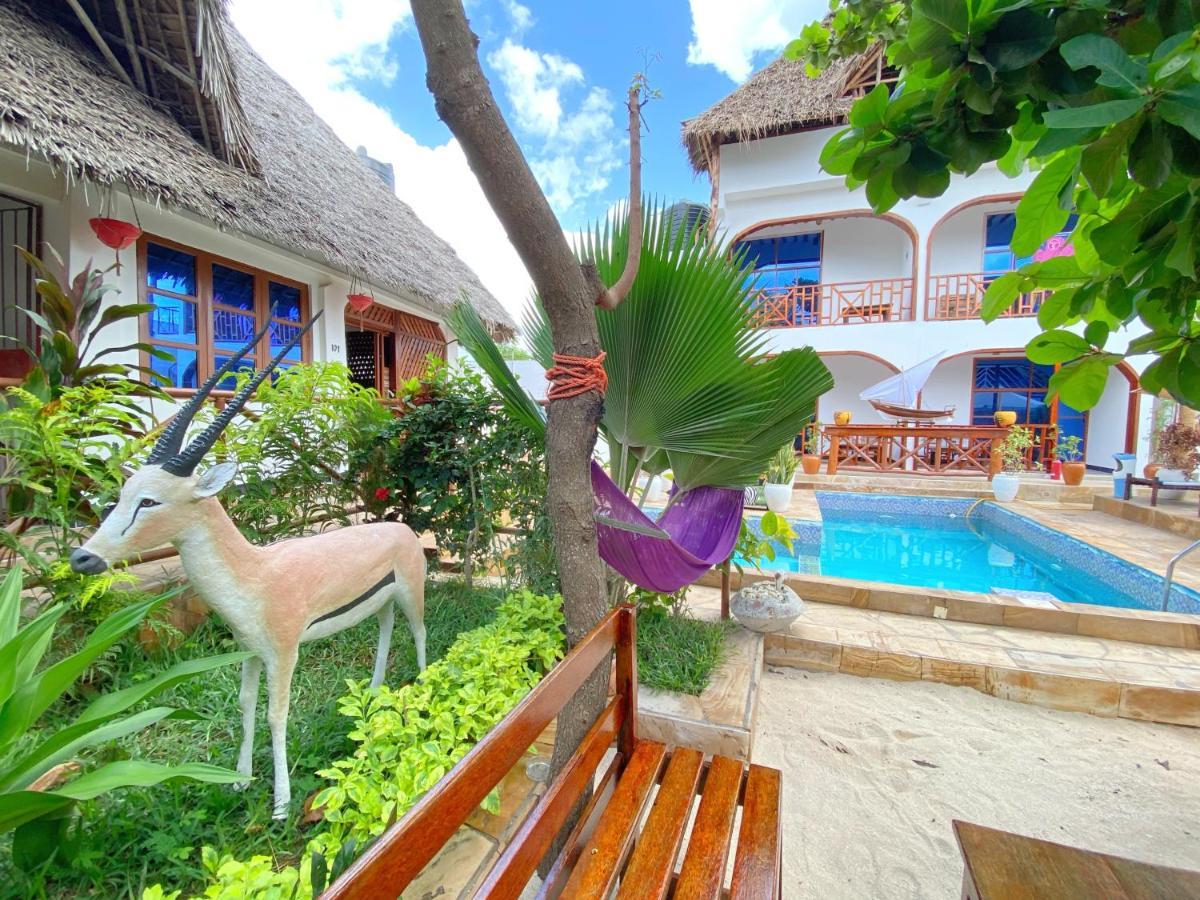 Utulivu Bungalow Нунгви Екстериор снимка