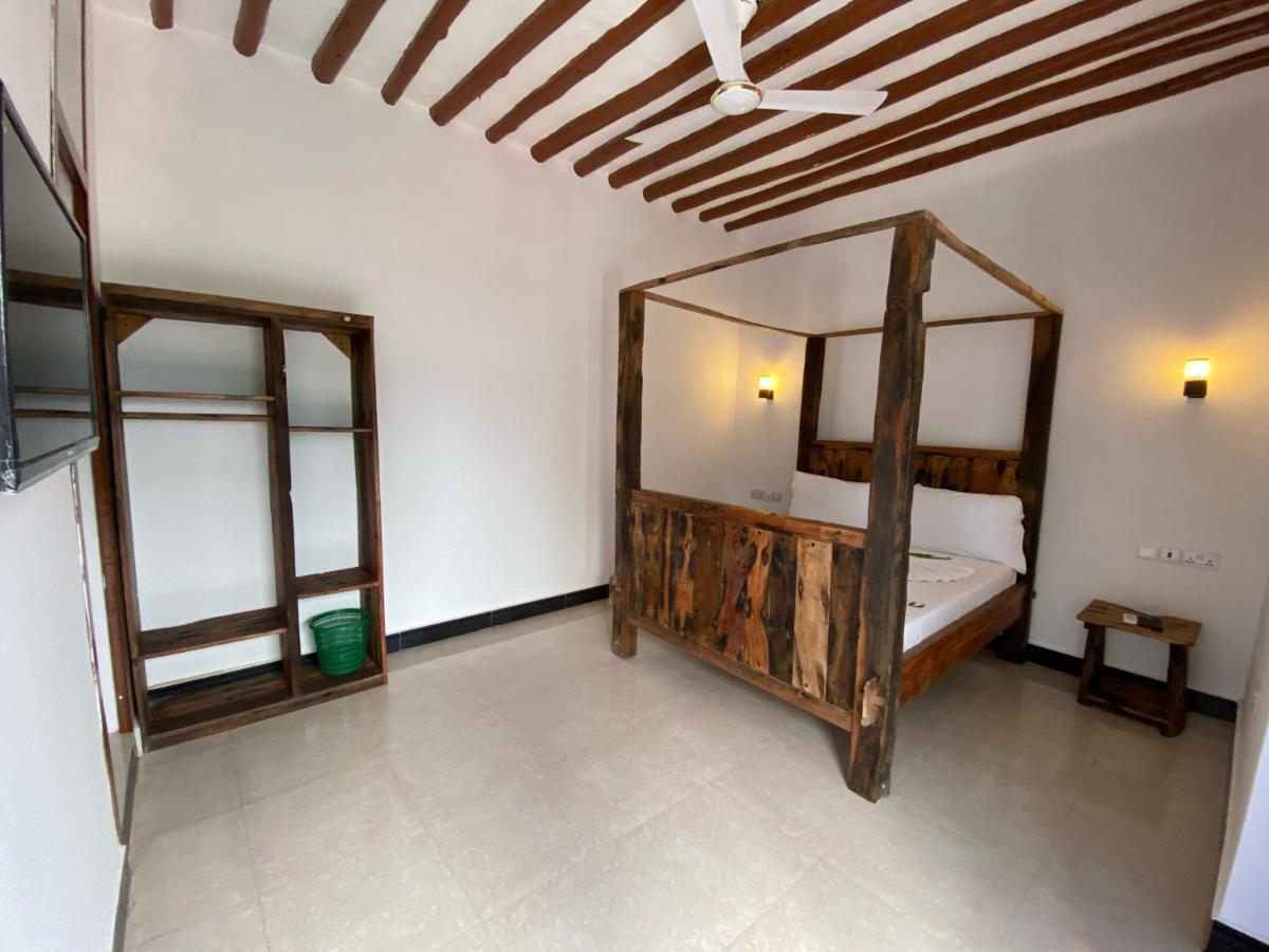 Utulivu Bungalow Нунгви Екстериор снимка