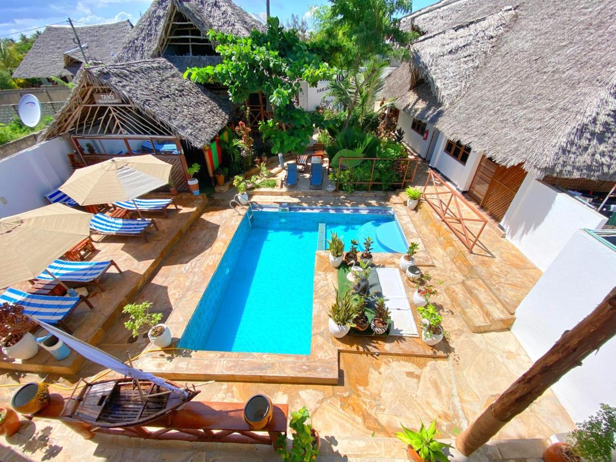 Utulivu Bungalow Нунгви Екстериор снимка