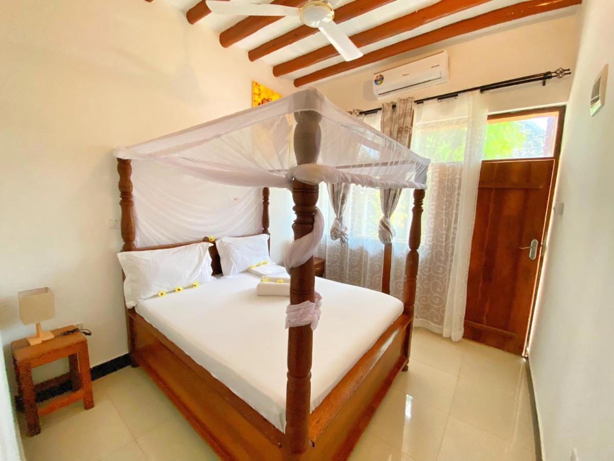 Utulivu Bungalow Нунгви Екстериор снимка