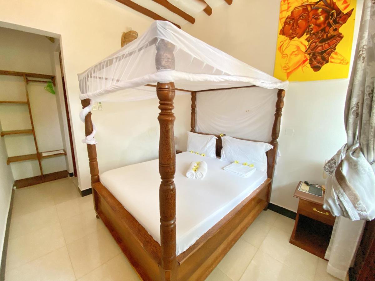 Utulivu Bungalow Нунгви Екстериор снимка