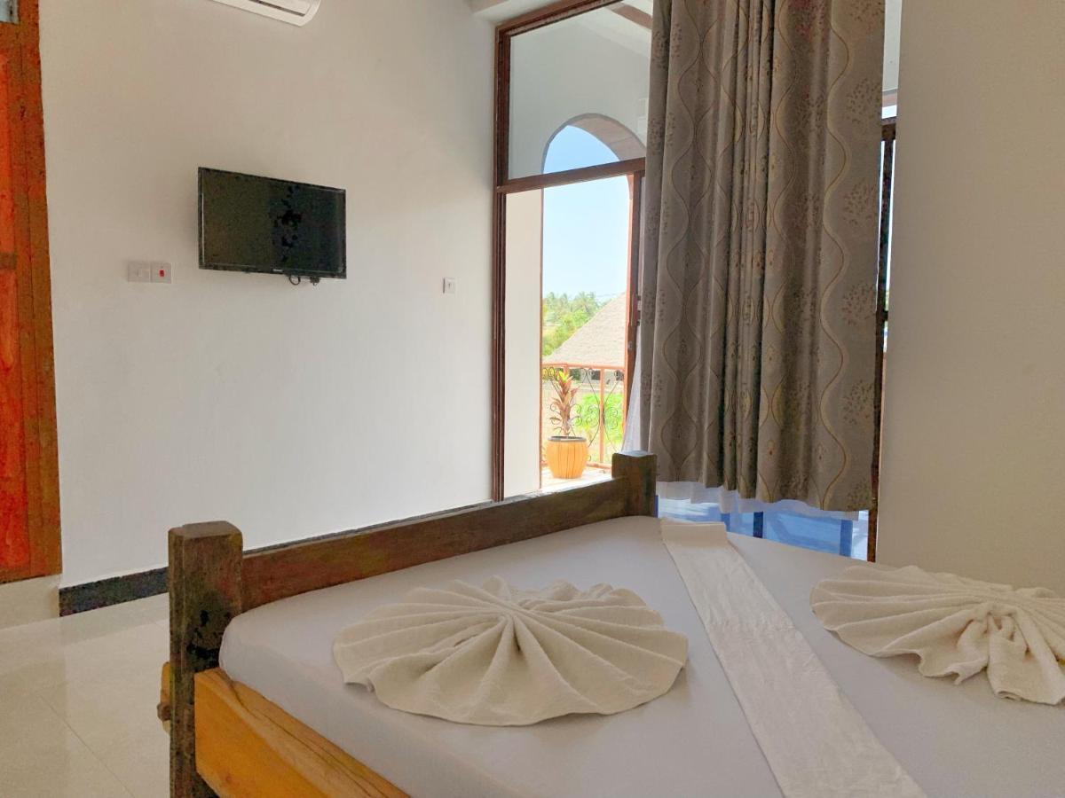 Utulivu Bungalow Нунгви Екстериор снимка