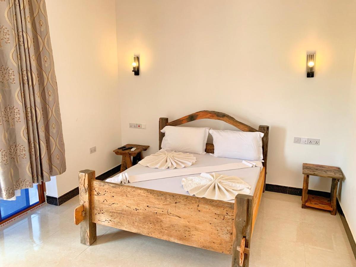 Utulivu Bungalow Нунгви Екстериор снимка