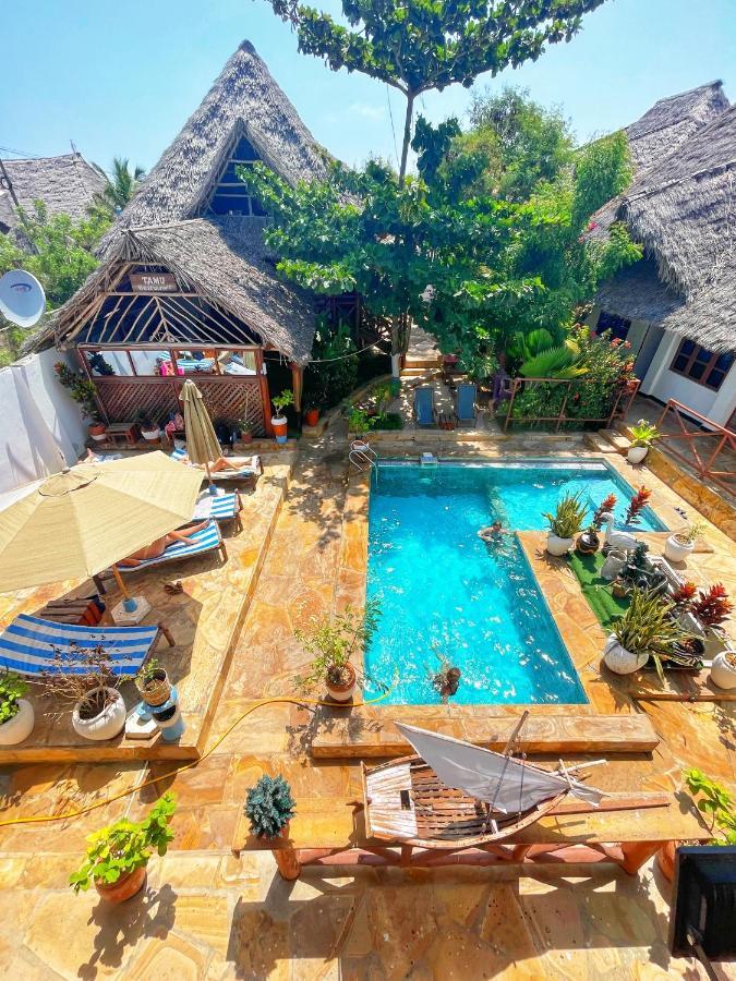 Utulivu Bungalow Нунгви Екстериор снимка